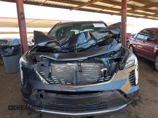 2020 Cadillac XT4 FWD Premium Luxury with VIN 1GYFZCR49LF153429, listed as a IAAI auction lot 42294239 with 45,450 mi miles and . Bid and sale history available at DreamBid. Image 6.