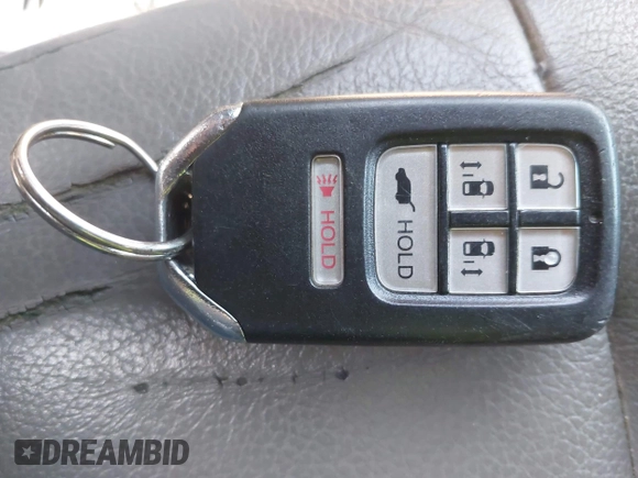 2015 Honda Odyssey EX-L with VIN 5FNRL5H67FB130663, listed as a IAAI auction lot 41988034 with 180,254 mi miles and . Bid and sale history available at carsss.com. Image 11.