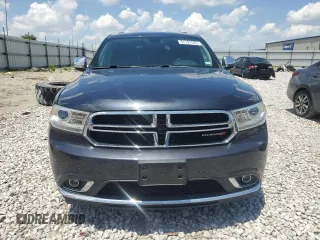 2014 Dodge Durango Limited с VIN 1C4RDHDG6EC390464, выставлен на аукционе Copart как лот 61191595 с пробегом 111 763 миль миль и Списание • Salvage title. История ставок и продаж доступна на DreamBid. Изображение 5.