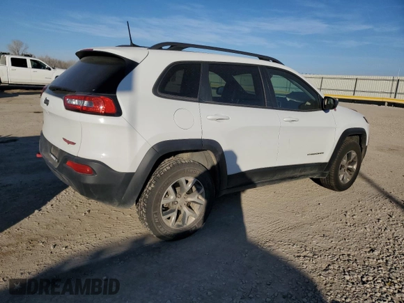 2016 Jeep Cherokee Trailhawk z VIN 1C4PJMBS2GW334801, wystawiony jako Copart lot #87434324 z przebiegiem 92 887 mil mil oraz Szkoda całkowita • Salvage title. Historia ofert i sprzedaży dostępna na DreamBid. Obrazek 3.