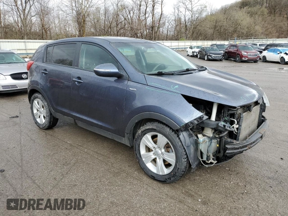 2012 Kia Sportage LX with VIN KNDPBCA25C7285039, listed as a Copart auction lot 52620735 with 197,305 mi miles and Salvage title. Bid and sale history available at DreamBid. Image 4.