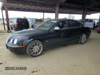 2007 Jaguar S-Type 3.0 with VIN SAJWA01A17FN79460, listed as a Copart auction lot 48210315 with 103,545 mi miles and Salvage Title. Bid and sale history available at carsss.com. Image 1.