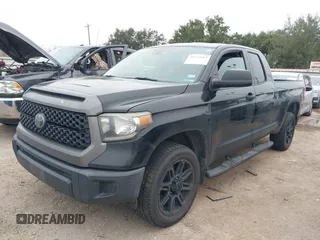 2019 Toyota Tundra SR with VIN 5TFRM5F1XKX143105, listed as a IAAI auction lot 41274567 with 180,602 mi miles and . Bid and sale history available at DreamBid. Image 18.