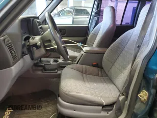 1997 Jeep Cherokee SE with VIN 1J4FJ28S0VL551442, listed as a Copart auction lot 49215195 with 164,356 mi miles and Salvage Title. Bid and sale history available at carsss.com. Image 7.