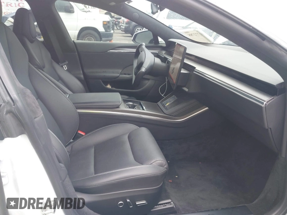 2022 Tesla Model S Plaid with VIN 5YJSA1E65NF488864, listed as a IAAI auction lot 41772788 with 33,915 mi miles and . Bid and sale history available at DreamBid. Image 5.