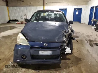 2003 Suzuki Aerio S z VIN JS2RA41S035159741, wystawiony jako Copart lot #88080235 z przebiegiem Nie podano mil oraz Szkoda całkowita • Salvage title. Historia ofert i sprzedaży dostępna na DreamBid. Obrazek 5.