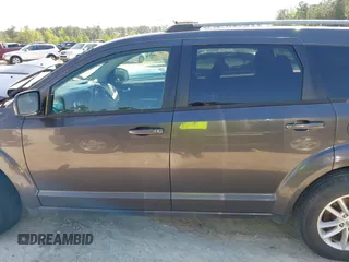 2017 Dodge Journey SXT with VIN 3C4PDCBG4HT589891, listed as a IAAI auction lot 42017420 with 135,740 mi miles and . Bid and sale history available at carsss.com. Image 13.