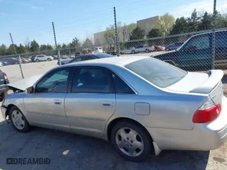 2004 Toyota Avalon XL with VIN 4T1BF28B34U376467, listed as a IAAI auction lot 41883436 with 183,114 mi miles. Bid and sale history available at carsss.com. Image 13.