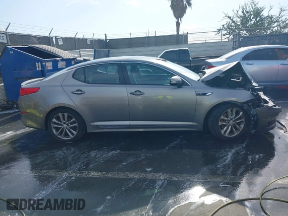 2015 Kia Optima SX Turbo with VIN 5XXGR4A69FG474261, listed as a IAAI auction lot 41103677 with 119,988 mi miles. Bid and sale history available at carsss.com. Image 13.