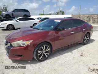 2017 Nissan Maxima Platinum with VIN 1N4AA6AP3HC369418, listed as a Copart auction lot 60199465 with 164,247 mi miles and Salvage title. Bid and sale history available at DreamBid. Image 1.