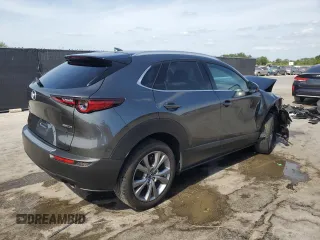 2023 Mazda CX-30 S Premium z VIN 3MVDMBDM9PM558451, wystawiony jako Copart lot #53997465 z przebiegiem 27 633 mil mil oraz Nie do naprawy • Non repairable. Historia ofert i sprzedaży dostępna na DreamBid. Obrazek 3.