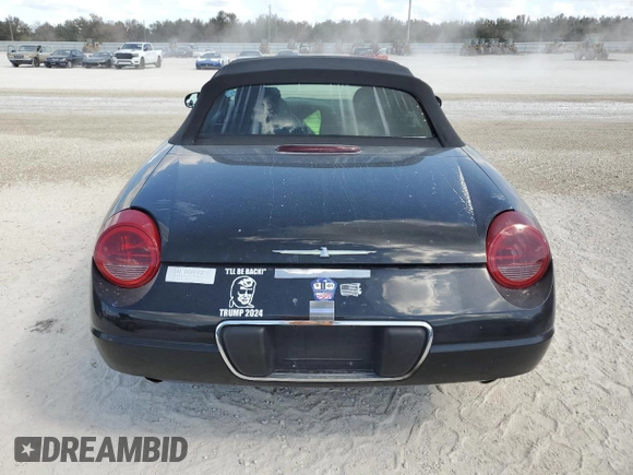 2002 Ford Thunderbird Hardtop Premium with VIN 1FAHP60A12Y120989, listed as a Copart auction lot 77573084 with Not Provided miles and Salvage Title. Bid and sale history available at DreamBid. Image 6.