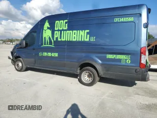 2024 Ford Transit Cargo with VIN 1FTRU8XG8RKA15196, listed as a Copart auction lot 84198984 with 12,267 mi miles and Salvage Title. Bid and sale history available at DreamBid. Image 2.