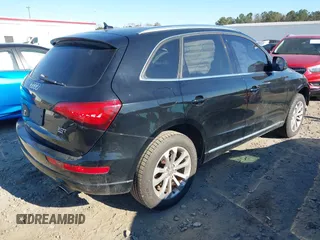 2014 Audi Q5 Premium with VIN WA1CFAFP4EA017515, listed as a IAAI auction lot 41000205 with 194,104 mi miles and . Bid and sale history available at DreamBid. Image 4.