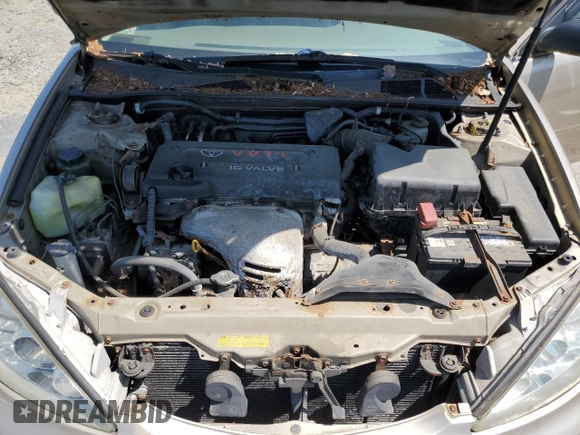 2005 Toyota Camry STD z VIN JTDBE32K850302413, wystawiony jako Copart lot #60884445 z przebiegiem 342 219 mil mil oraz Czysty tytuł • Clean title. Historia ofert i sprzedaży dostępna na DreamBid. Obrazek 11.