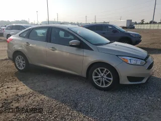 2015 Ford Focus SE with VIN 1FADP3F22FL383928, listed as a Copart auction lot 64835175 with 77,594 mi miles and Clean title. Bid and sale history available at DreamBid. Image 4.