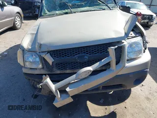 2004 Ford Explorer Sport Trac XLS z VIN 1FMZU67K74UC30067, wystawiony jako IAAI lot #41680436 z przebiegiem Nie podano mil oraz . Historia ofert i sprzedaży dostępna na DreamBid. Obrazek 11.