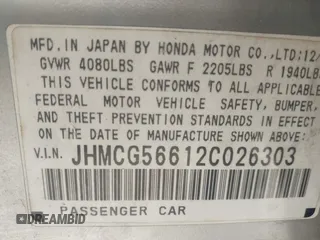 2002 Honda Accord EX z VIN JHMCG56612C026303, wystawiony jako IAAI lot #41992812 z przebiegiem 153 021 mil mil oraz . Historia ofert i sprzedaży dostępna na DreamBid. Obrazek 9.
