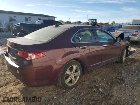 2012 Acura TSX with VIN JH4CU2F42CC006911, listed as a Copart auction lot 83497074 with 99,770 mi miles and Salvage Title. Bid and sale history available at carsss.com. Image 3.