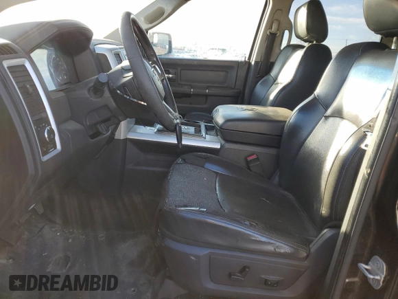 2009 Dodge 1500 Laramie z VIN 1D3HV13T89S714354, wystawiony jako Copart lot #87633735 z przebiegiem 323 197 mil mil oraz Czysty tytuł • Clean title. Historia ofert i sprzedaży dostępna na DreamBid. Obrazek 7.