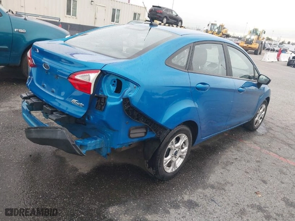 2016 Ford Fiesta SE with VIN 3FADP4BJ1GM174263, listed as a IAAI auction lot 41784742 with 57,175 mi miles. Bid and sale history available at carsss.com. Image 4.