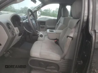 2006 Ford F-150 XL with VIN 1FTRF12W26NA76716, listed as a Copart auction lot 60450765 with 96,369 mi miles and Salvage title. Bid and sale history available at DreamBid. Image 7.