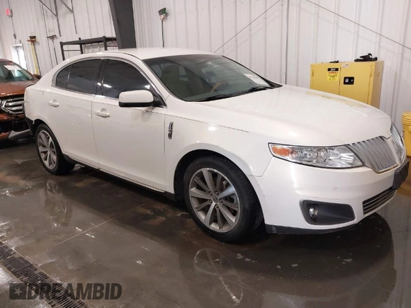 2012 Lincoln MKS with VIN 1LNHL9ER2CG803230, listed as a IAAI auction lot 41734620 with 66,585 mi miles. Bid and sale history available at carsss.com. Image 1.