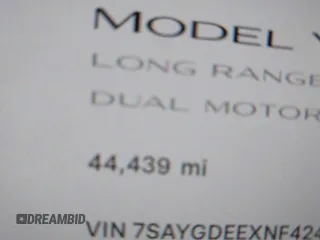 2022 Tesla Model Y Long Range with VIN 7SAYGDEEXNF424856, listed as a IAAI auction lot 41059718 with 44,439 mi miles and . Bid and sale history available at carsss.com. Image 16.