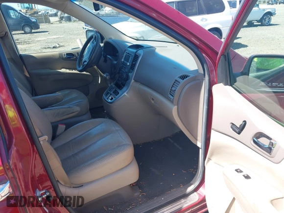 2012 Kia Sedona EX with VIN KNDMH4C70C6417629, listed as a IAAI auction lot 42039065 with 288,061 mi miles. Bid and sale history available at carsss.com. Image 5.