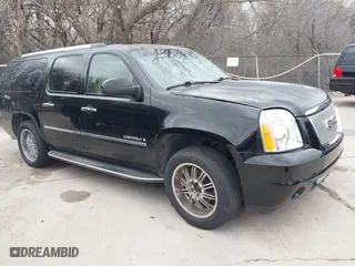 2009 GMC Yukon XL Denali with VIN 1GKFK06269J122435, listed as a IAAI auction lot 41443329 with 199,989 mi miles. Bid and sale history available at carsss.com. Image 1.