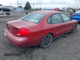 2002 Ford Taurus SE Standard with VIN 1FAFP53U12G199397, listed as a IAAI auction lot 41899248 with 132,419 mi miles and . Bid and sale history available at carsss.com. Image 4.