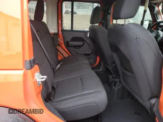 2023 Jeep Wrangler Sport S with VIN 1C4HJXDG6PW675682, listed as a Copart auction lot 41446855 with 22,816 mi miles and Salvage Title. Bid and sale history available at DreamBid. Image 11.