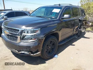 2017 Chevrolet Tahoe LS with VIN 1GNSCAKC3HR328833, listed as a IAAI auction lot 41993364 with 124,817 mi miles and . Bid and sale history available at DreamBid. Image 2.