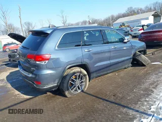 2021 Jeep Grand Cherokee 80th Anniversary with VIN 1C4RJFBG2MC666167, listed as a IAAI auction lot 41392185 with 79,518 mi miles and . Bid and sale history available at DreamBid. Image 4.
