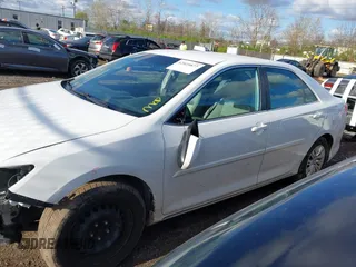 2014 Toyota Camry L with VIN 4T4BF1FK1ER424875, listed as a IAAI auction lot 42025877 with 113,919 mi miles. Bid and sale history available at carsss.com. Image 14.