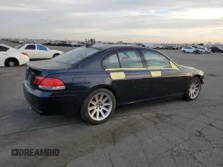 2006 BMW 7 Series 750i with VIN WBAHL83506DT05674, listed as a Copart auction lot 77176834 with 263,495 mi miles and Salvage title. Bid and sale history available at DreamBid. Image 3.