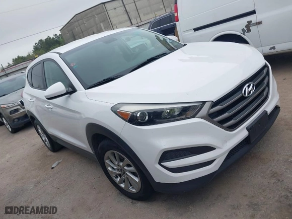 2016 Hyundai Tucson SE with VIN KM8J23A4XGU238521, listed as a IAAI auction lot 41886259 with 126,974 mi miles. Bid and sale history available at carsss.com. Image 1.