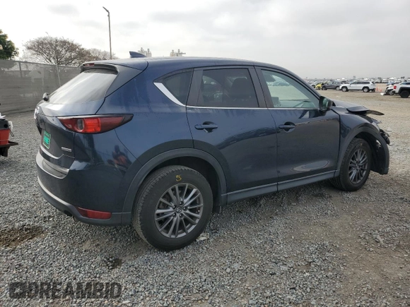 2021 Mazda CX-5 Touring with VIN JM3KFACM1M0313910, listed as a Copart auction lot 47834815 with 40,671 mi miles and Salvage Title. Bid and sale history available at carsss.com. Image 3.