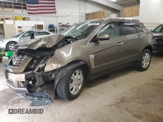 2014 Cadillac SRX Luxury Collection z VIN 3GYFNEE34ES652268, wystawiony jako Copart lot #54136545 z przebiegiem 99 542 mil mil oraz Szkoda całkowita • Salvage title. Historia ofert i sprzedaży dostępna na DreamBid. Obrazek 1.