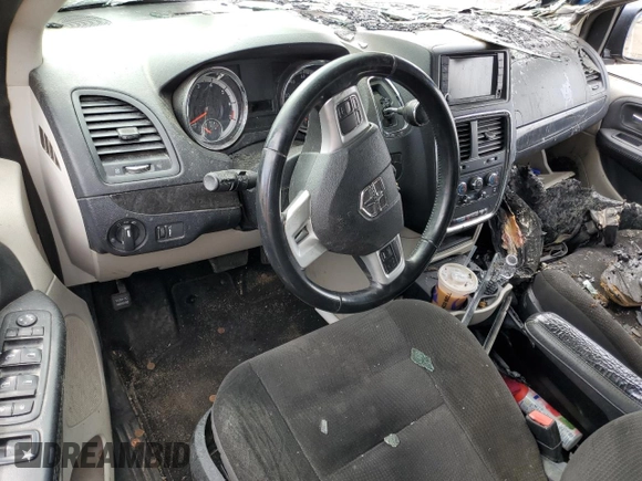 2017 Dodge Grand Caravan SE z VIN 2C4RDGBG2HR755893, wystawiony jako Copart lot #56722045 z przebiegiem Nie podano mil oraz Szkoda całkowita • Salvage title. Historia ofert i sprzedaży dostępna na DreamBid. Obrazek 8.