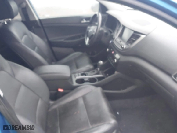 2017 Hyundai Tucson SE Plus with VIN KM8J33A42HU410216, listed as a IAAI auction lot 41337805 with 63,515 mi miles. Bid and sale history available at carsss.com. Image 5.