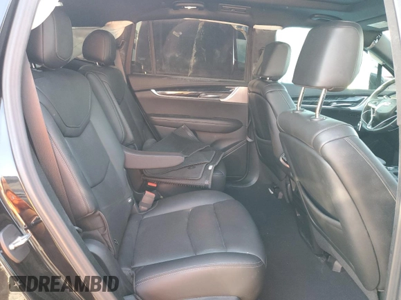 2023 Cadillac XT6 FWD Premium Luxury z VIN 1GYKPCRS5PZ101867, wystawiony jako Copart lot #51773545 z przebiegiem 31 322 mil mil oraz Szkoda całkowita • Salvage title. Historia ofert i sprzedaży dostępna na DreamBid. Obrazek 10.