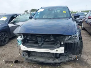 2021 Mazda CX-9 Carbon Edition with VIN JM3TCADY1M0516505, listed as a IAAI auction lot 42016644 with 50,900 mi miles and . Bid and sale history available at carsss.com. Image 13.