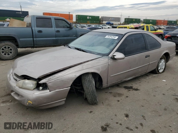 1994 Ford Thunderbird LX with VIN 1FALP6241RH110457, listed as a Copart auction lot 76384254 with 54,653 mi miles and Salvage Title. Bid and sale history available at DreamBid. Image 1.