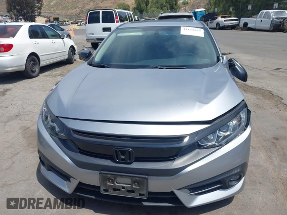 2018 Honda Civic EX-L z VIN JHMFC1F79JX037843, wystawiony jako IAAI lot #42121623 z przebiegiem 49 759 mil mil oraz . Historia ofert i sprzedaży dostępna na DreamBid. Obrazek 13.