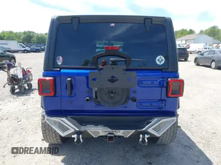 2019 Jeep Wrangler Unlimited Sport Altitude with VIN 1C4HJXDG2KW532866, listed as a IAAI auction lot 42320008 with 66,316 mi miles and . Bid and sale history available at DreamBid. Image 16.