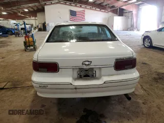 1996 Chevrolet Caprice 1SA Special Value z VIN 1G1BL52W3TR164138, wystawiony jako Copart lot #51371145 z przebiegiem 217 857 mil mil oraz Czysty tytuł • Clean title. Historia ofert i sprzedaży dostępna na DreamBid. Obrazek 6.