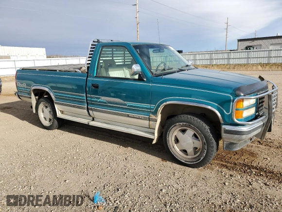 1994 GMC Sierra 1500 with VIN 1GTEK14K5RE539652, listed as a Copart auction lot 80877094 with 162,533 mi miles and Salvage Title. Bid and sale history available at DreamBid. Image 4.