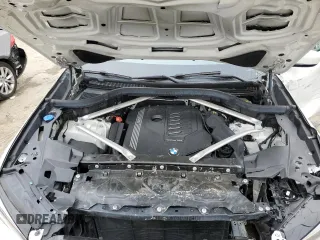 2020 BMW X5 xDrive40i z VIN 5UXCR6C02L9C46986, wystawiony jako Copart lot #59624005 z przebiegiem Nie podano mil oraz Szkoda całkowita • Salvage title. Historia ofert i sprzedaży dostępna na DreamBid. Obrazek 12.