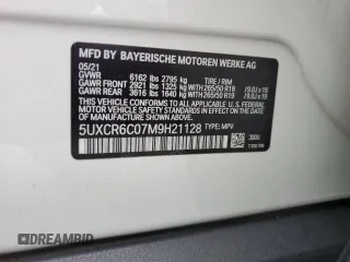 2021 BMW X5 xDrive40i z VIN 5UXCR6C07M9H21128, wystawiony jako Copart lot #54084915 z przebiegiem 26 966 mil mil oraz Szkody całkowita. Historia ofert i sprzedaży dostępna na DreamBid. Obrazek 13.